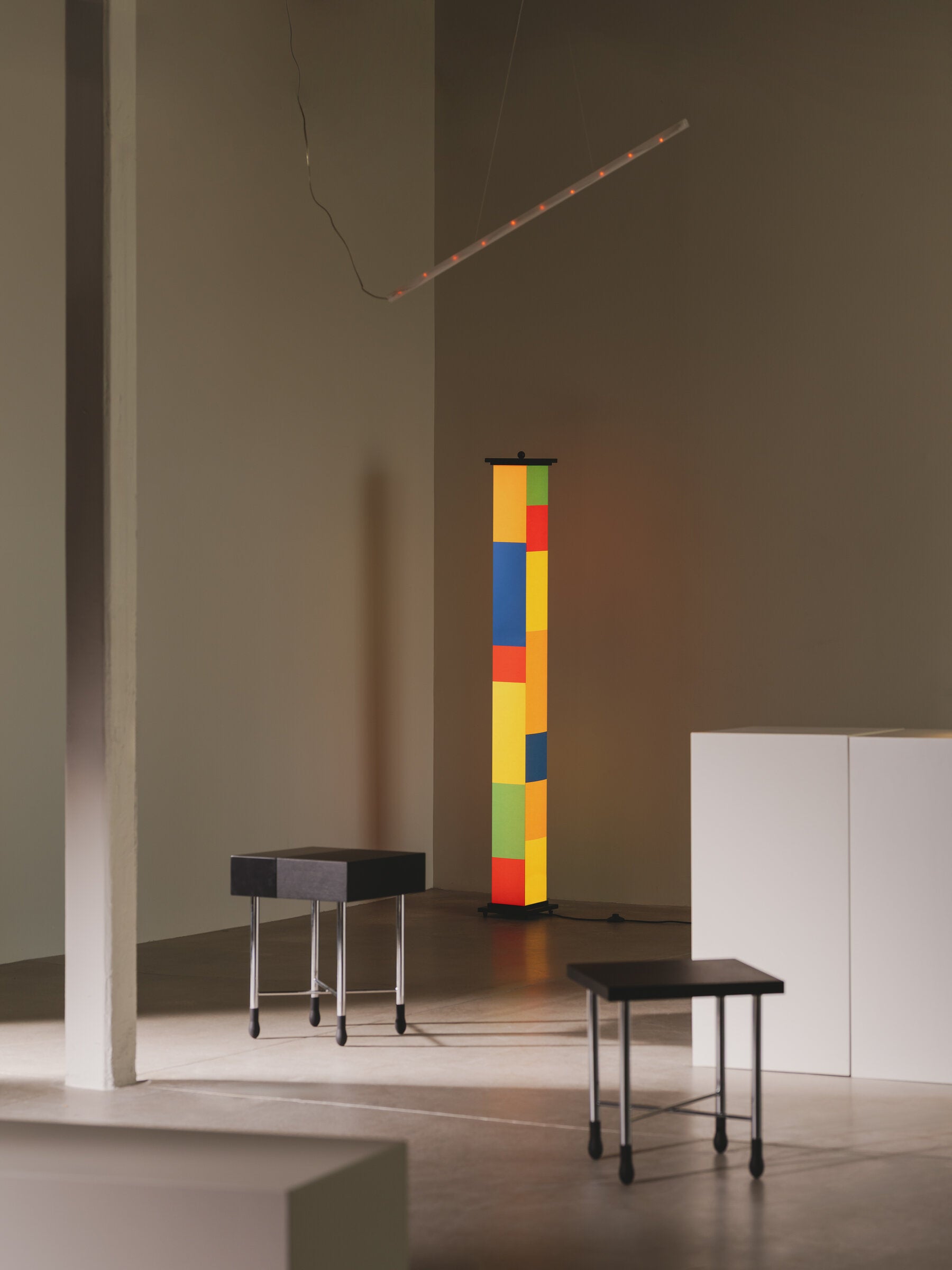 Indoor LED floor lamp with colorful architectural design