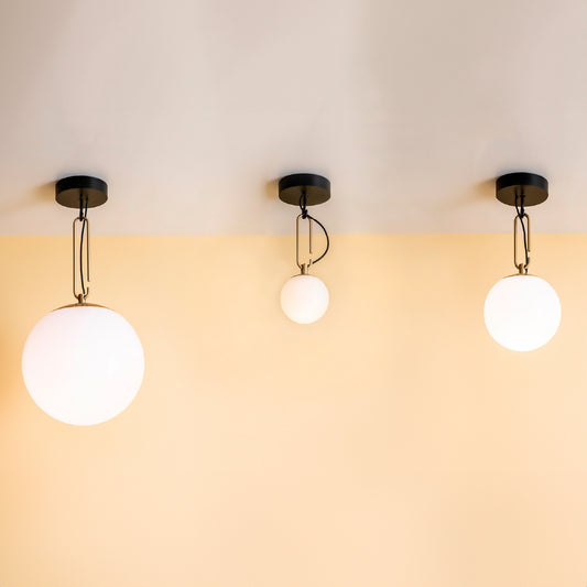 Artemide NH Ceiling Light in a room setting