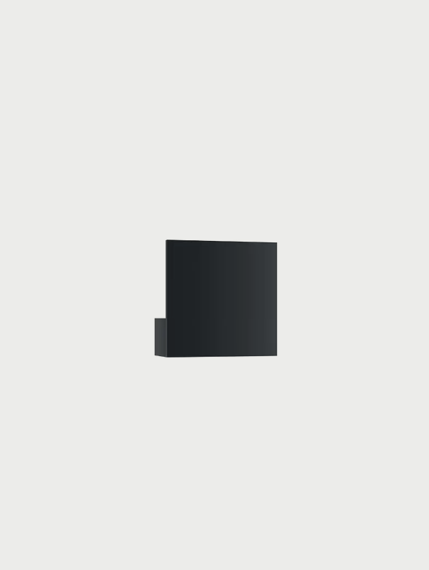 Matte black Lodes Puzzle Single Square mounted on a modern wall