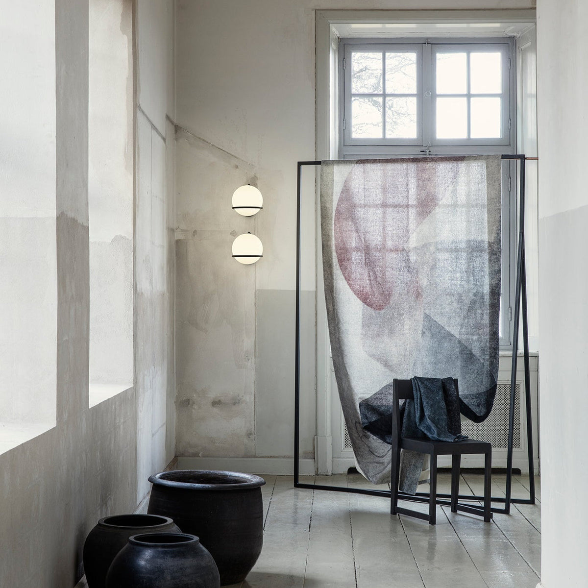 Model 238/1 by Astep — two mounted one above the other in a hallway
