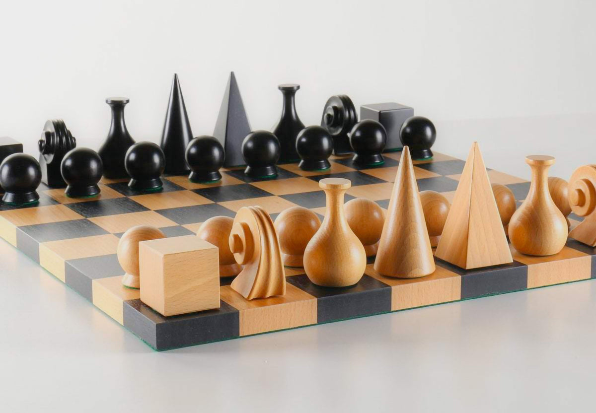 Man Ray chess figures close-up, cones, pyramids and cubes