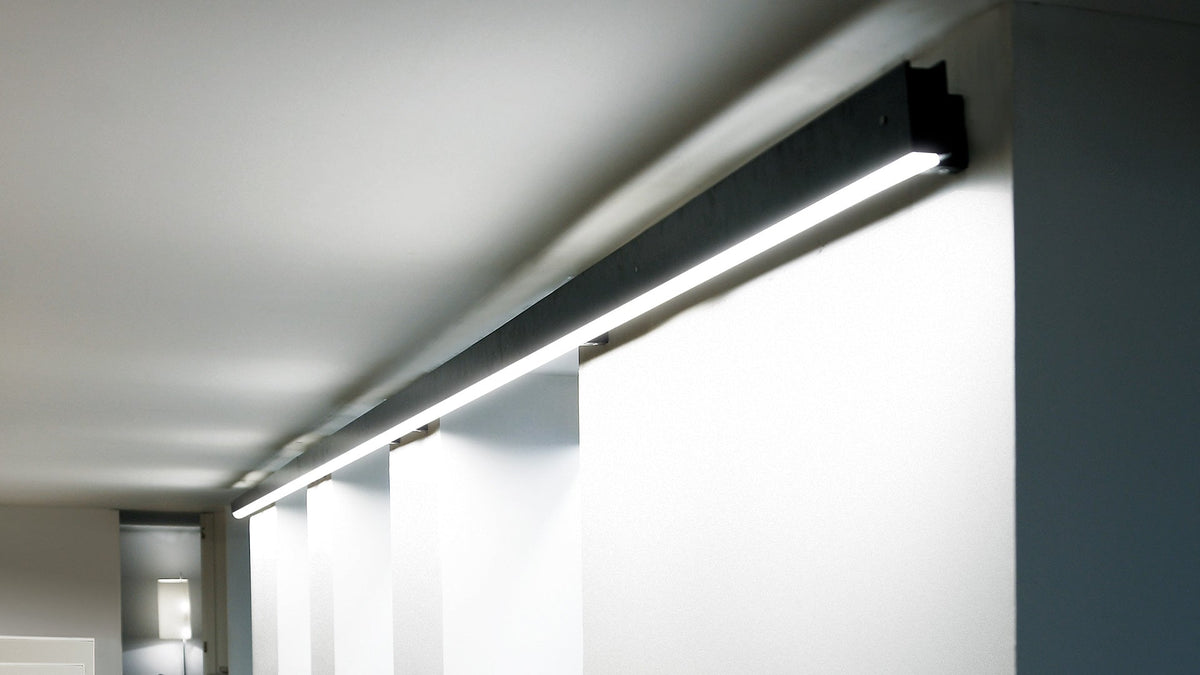 Marc Arm linear LED lamp by David Abad