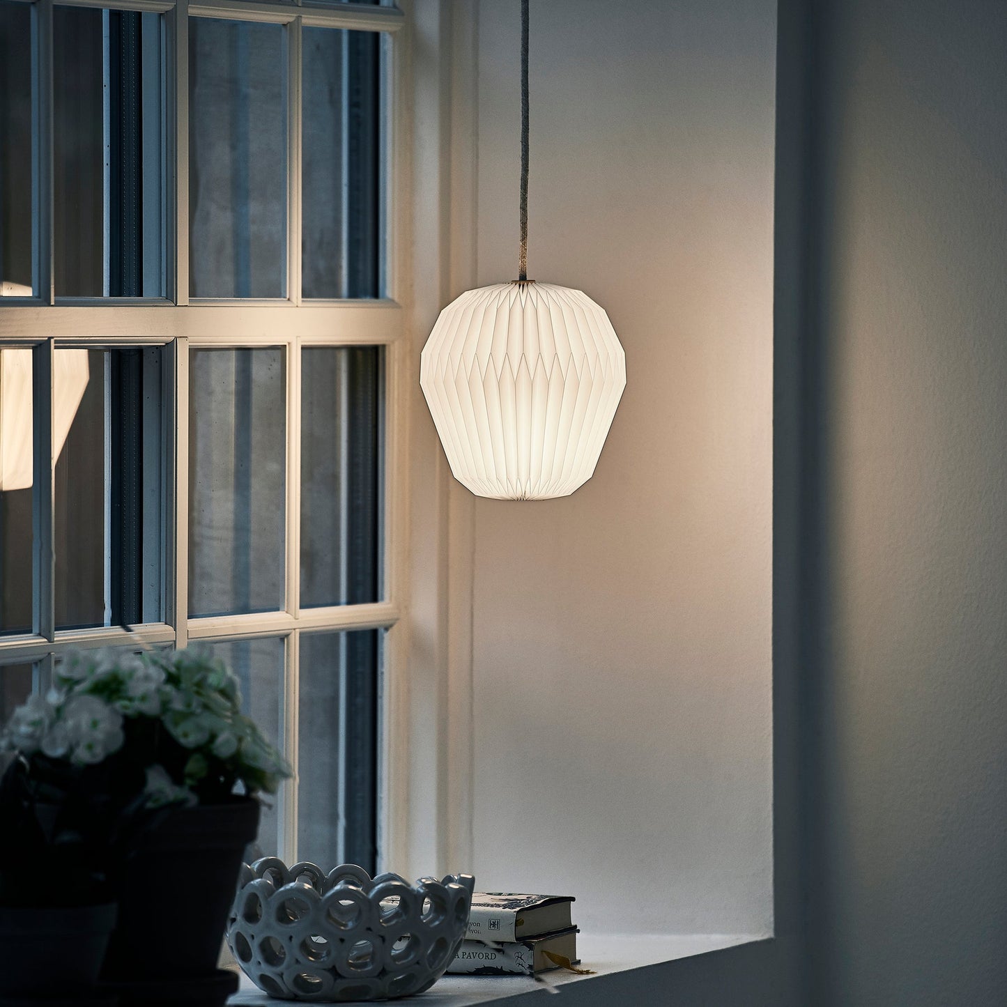 Le Klint Bouquet Pendant Medium installed in modern dining setting