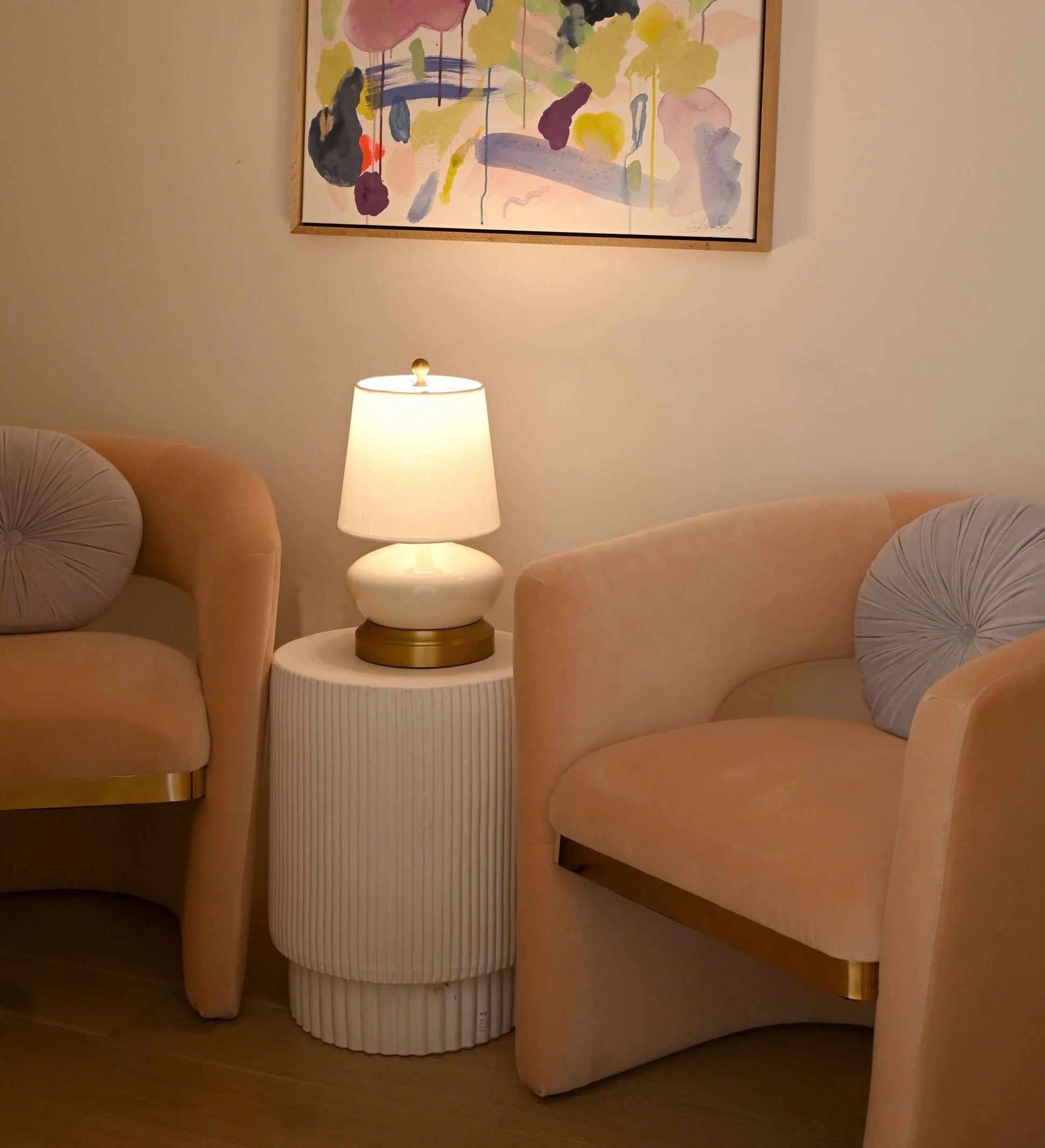 Rechargeable lamp with linen shade in contemporary hotel bedroom setting