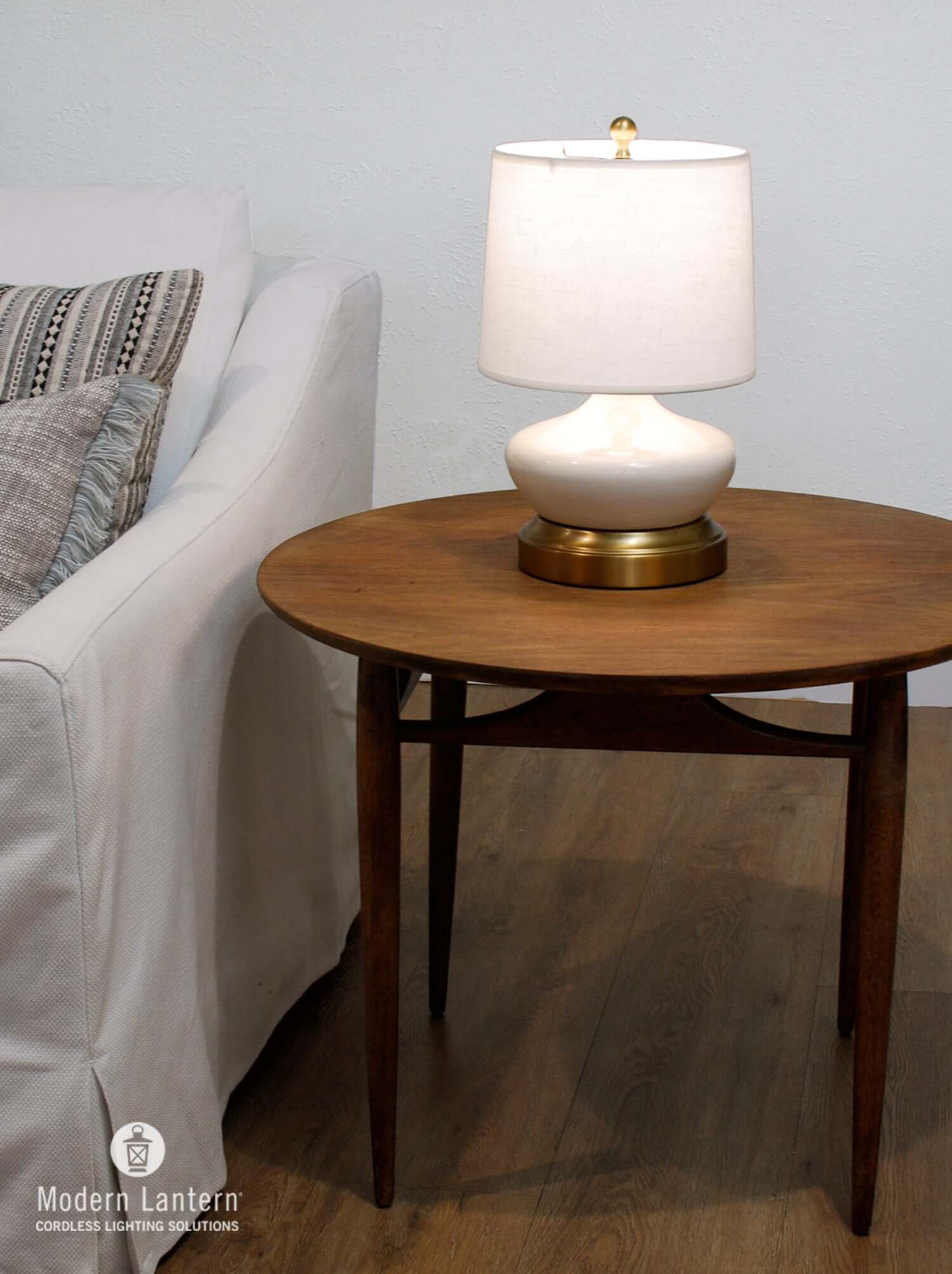 Ivory ceramic cordless lamp with warm LED light for reading nook