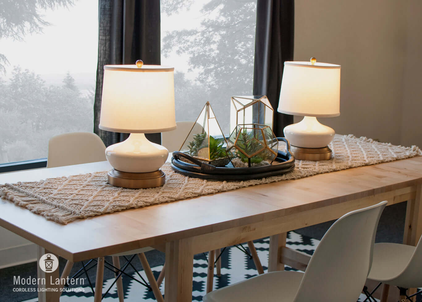 Cordless table lamp with brass base in modern coastal interior