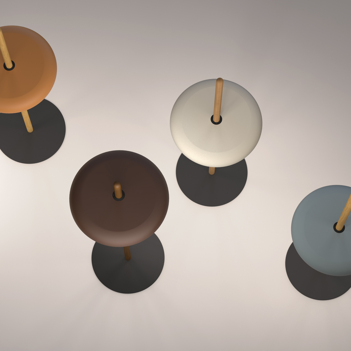 Portable Nivél floor lamp placed next to a sofa
