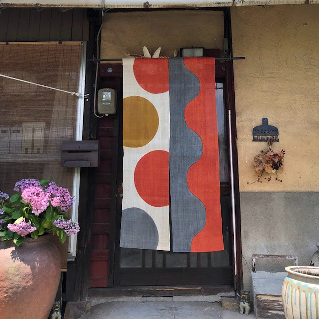 Noboriya Hand-Dyed Hemp Noren Door Curtain – Chigaimaru-Nami in a doorway