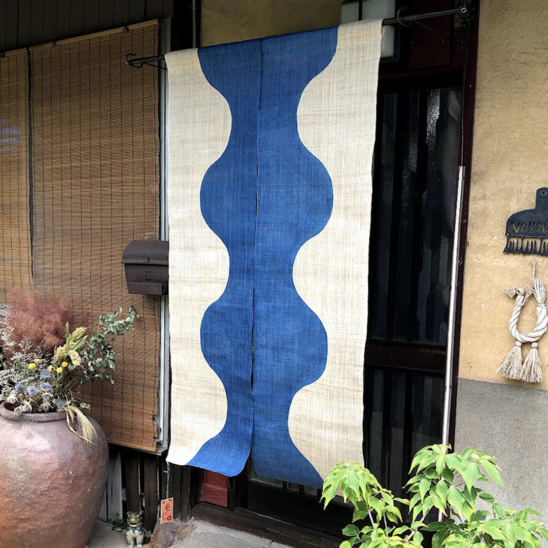 Noboriya Hand-Dyed Hemp Noren Door Curtain – Nami-Nami Blue in a doorway
