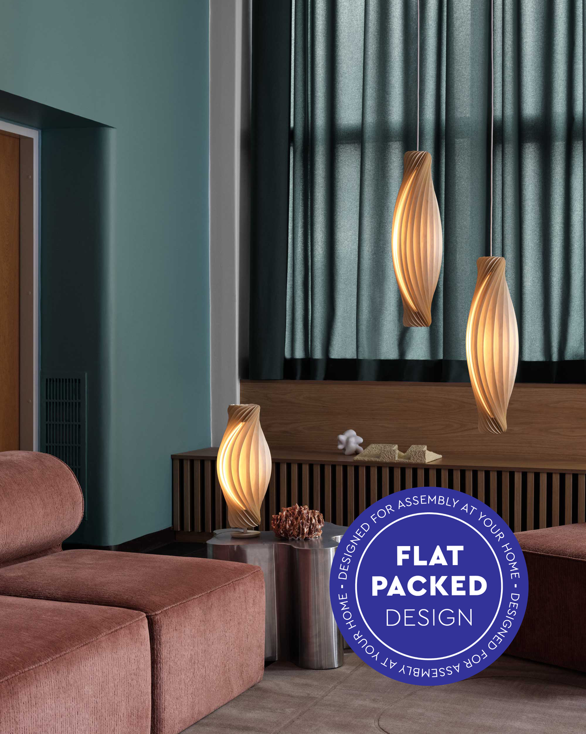 Tom Rossau No.111 pendant light – in a living room, with the flat-pack badge