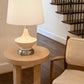 Oliver Ivory Cordless Table Lamp Brushed Nickel lighting up a cozy nook