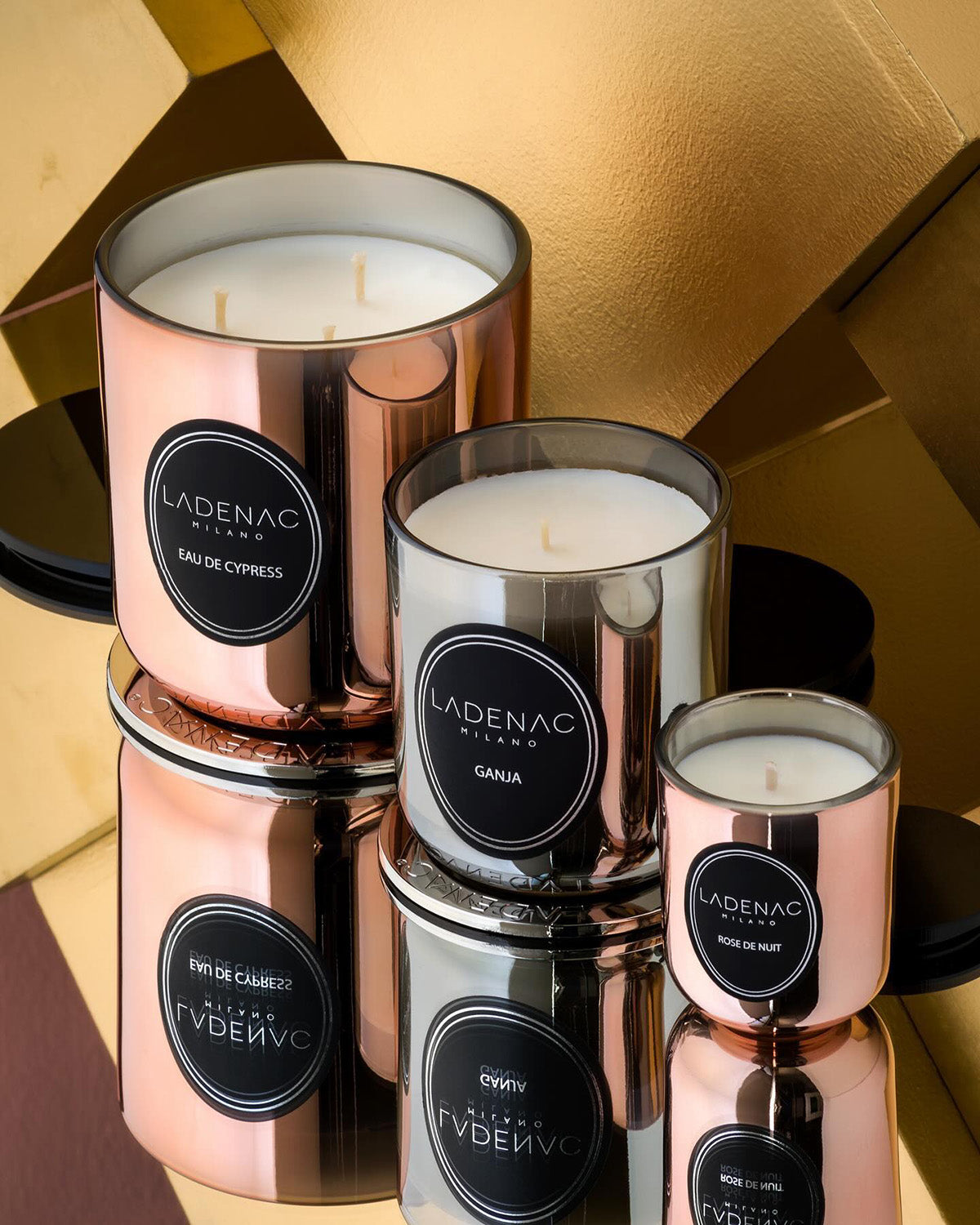Urban Senses 200 g scented candle by Ladenac Milano, candles on a gold and pink backdrop