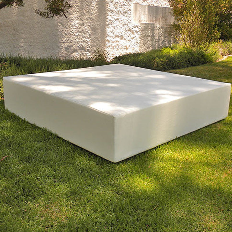 White Play Pad square resort bed on a lawn