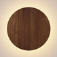 oiled walnut round minimalist LED wall light for hotel corridors and office reception areas