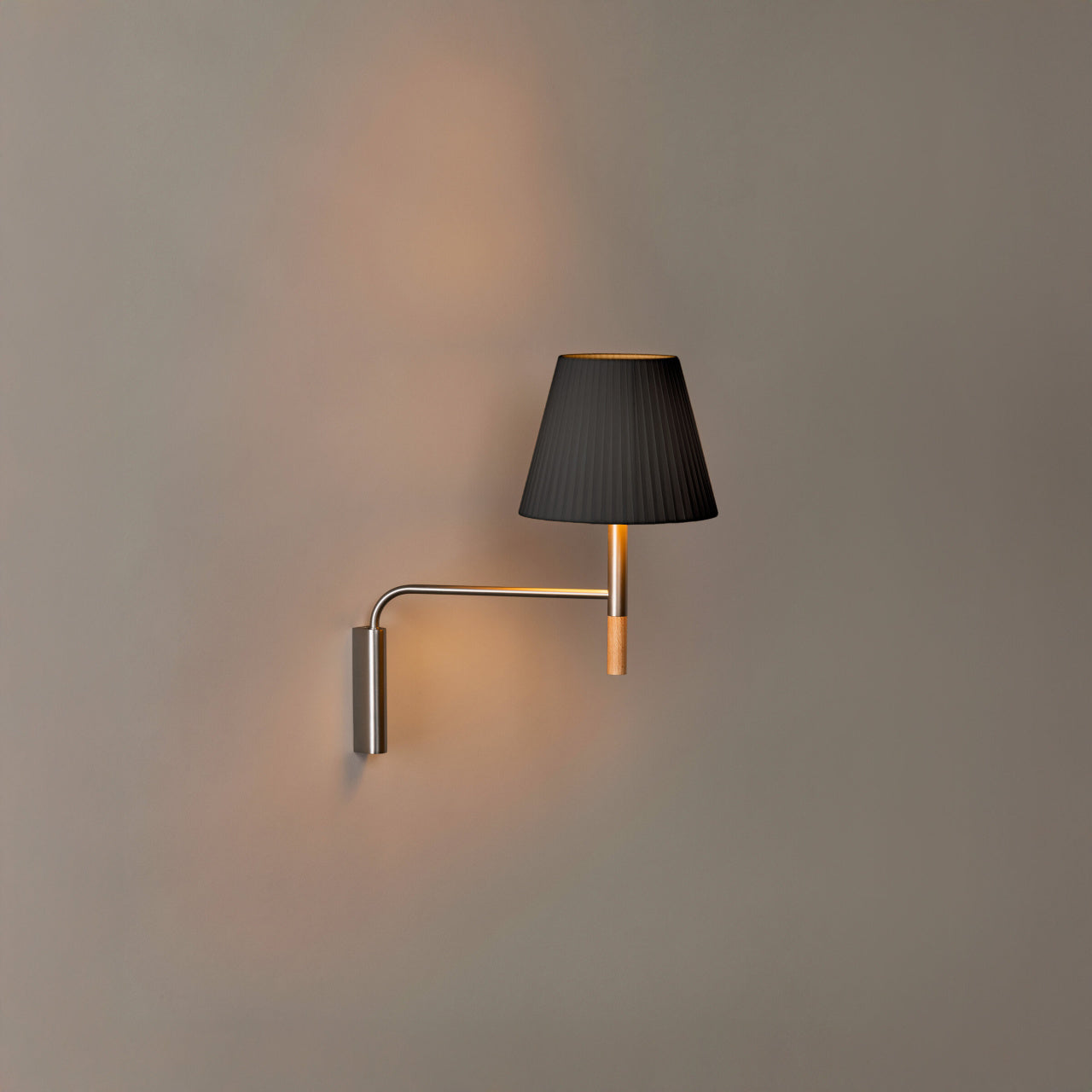 Contemporary black ribbon wall sconce with dimmable LED lighting and satin nickel hardware