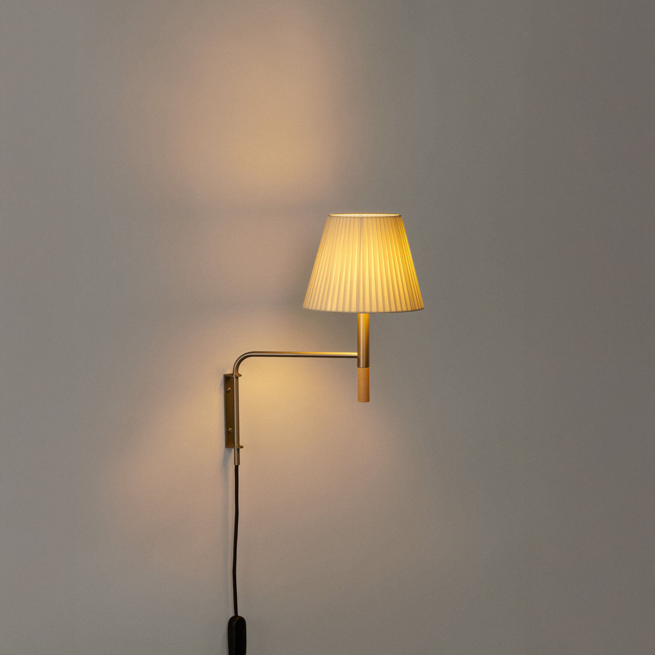 Spanish wall light with natural ribbon shade and dimmable LED compatibility for hospitality interiors