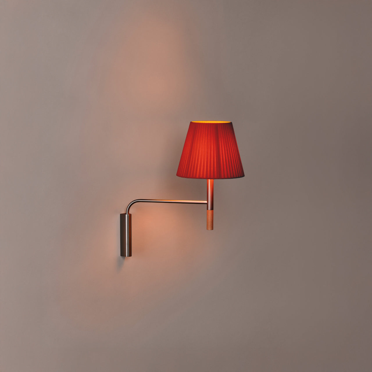 BC Swing Aram plug-in wall lamp with red amber ribbon shade for hospitality and residential interiors