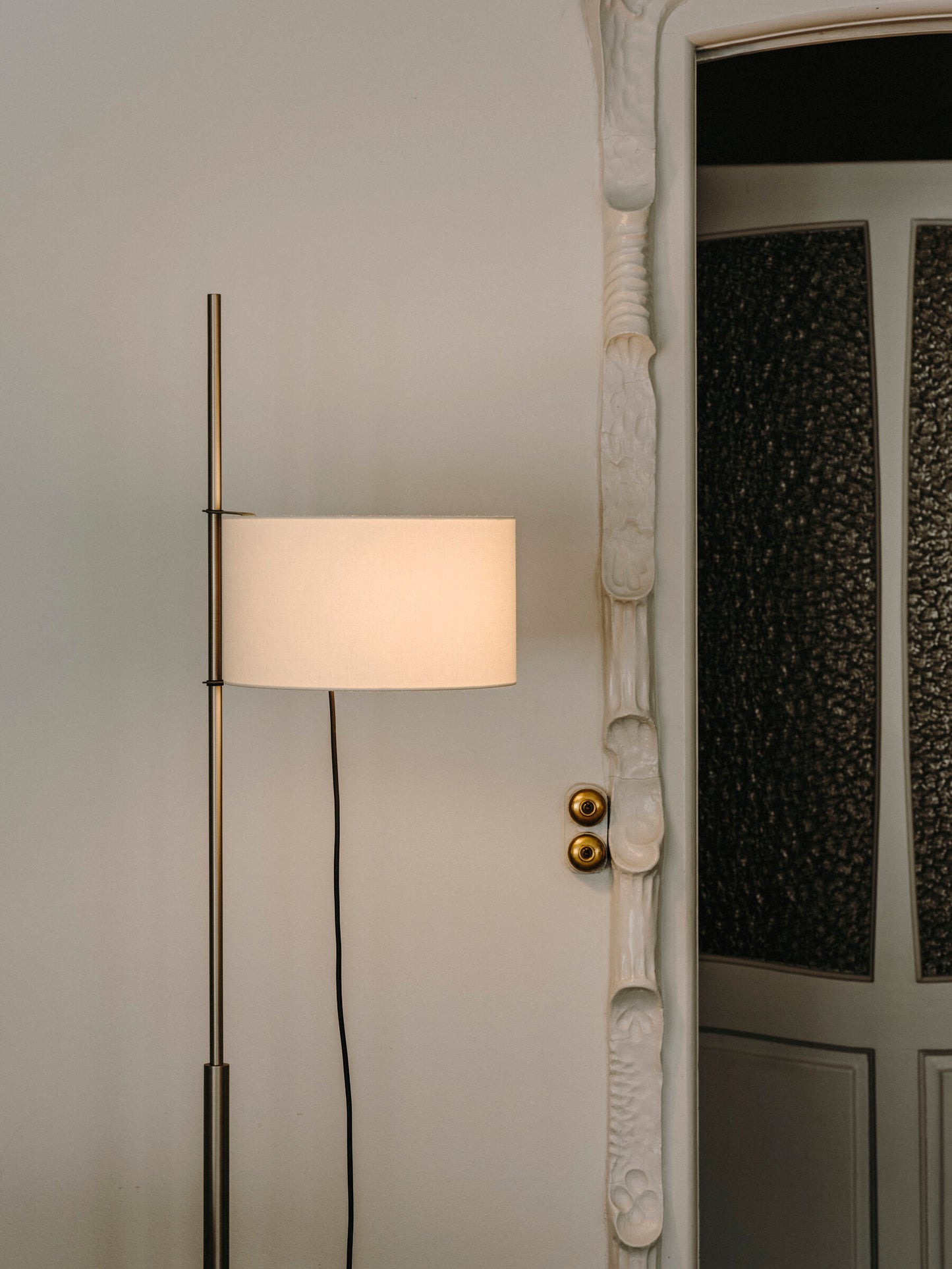 Modern architectural floor lamp by Santa & Cole with linen shade