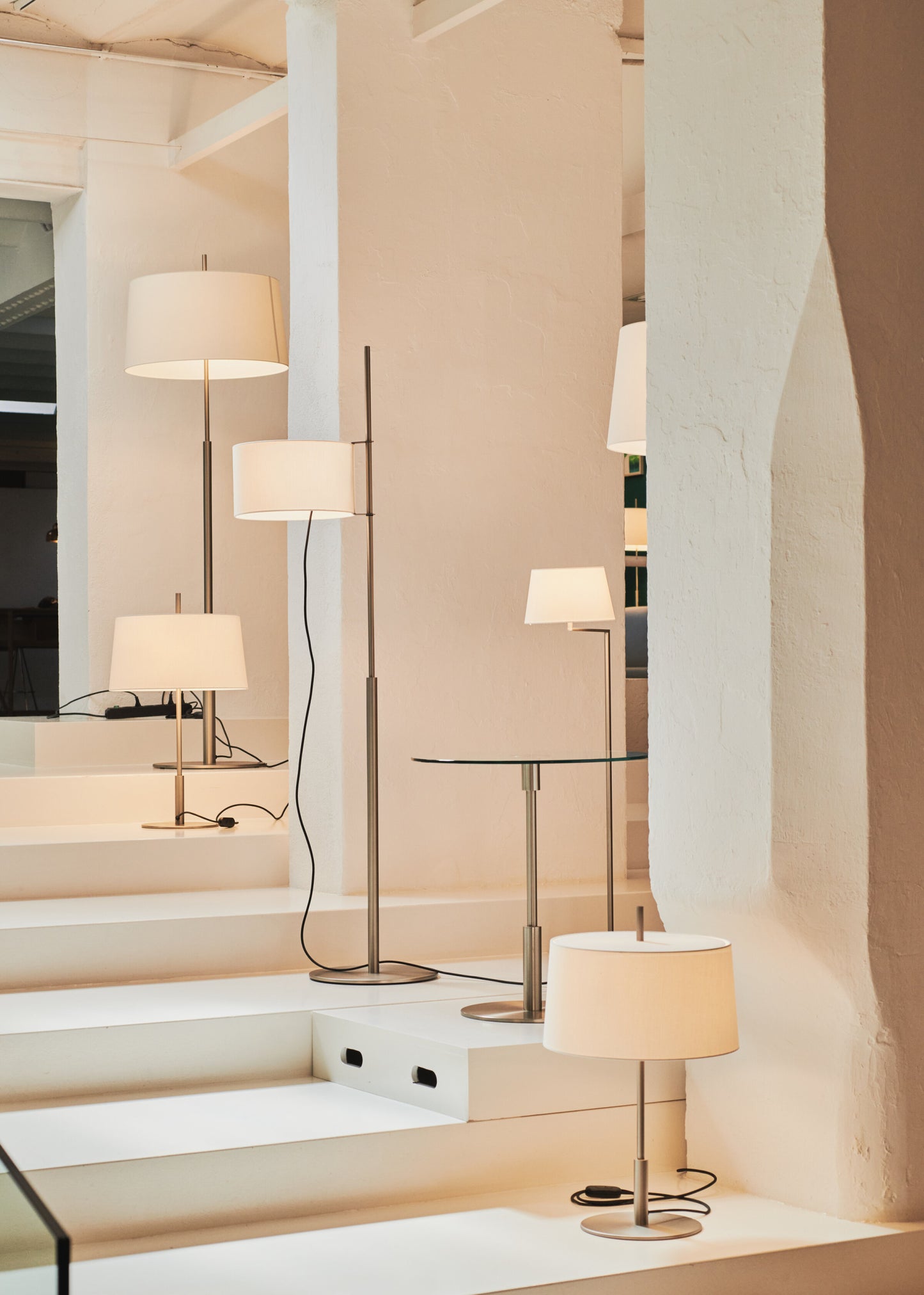 Designer floor lamp by Miguel Milá for modern residential interiors