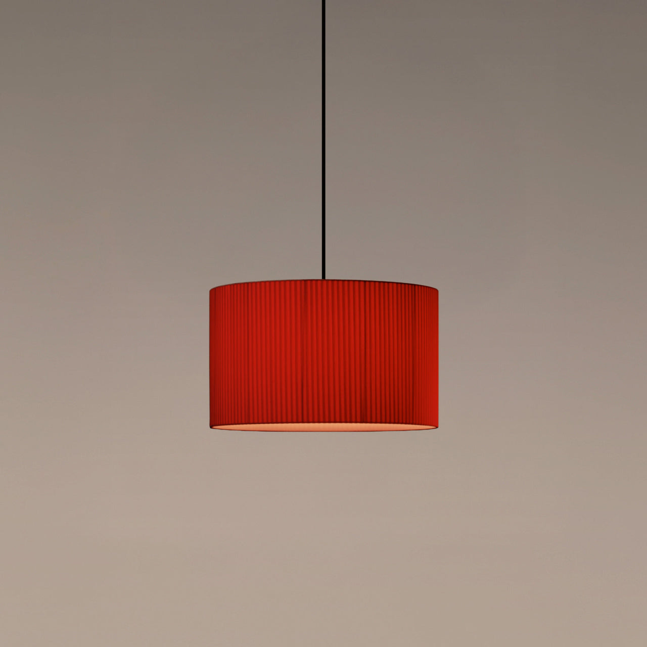 Santa & Cole Sísísí Cilíndricas pendant light with red ribbon shade for modern dining rooms