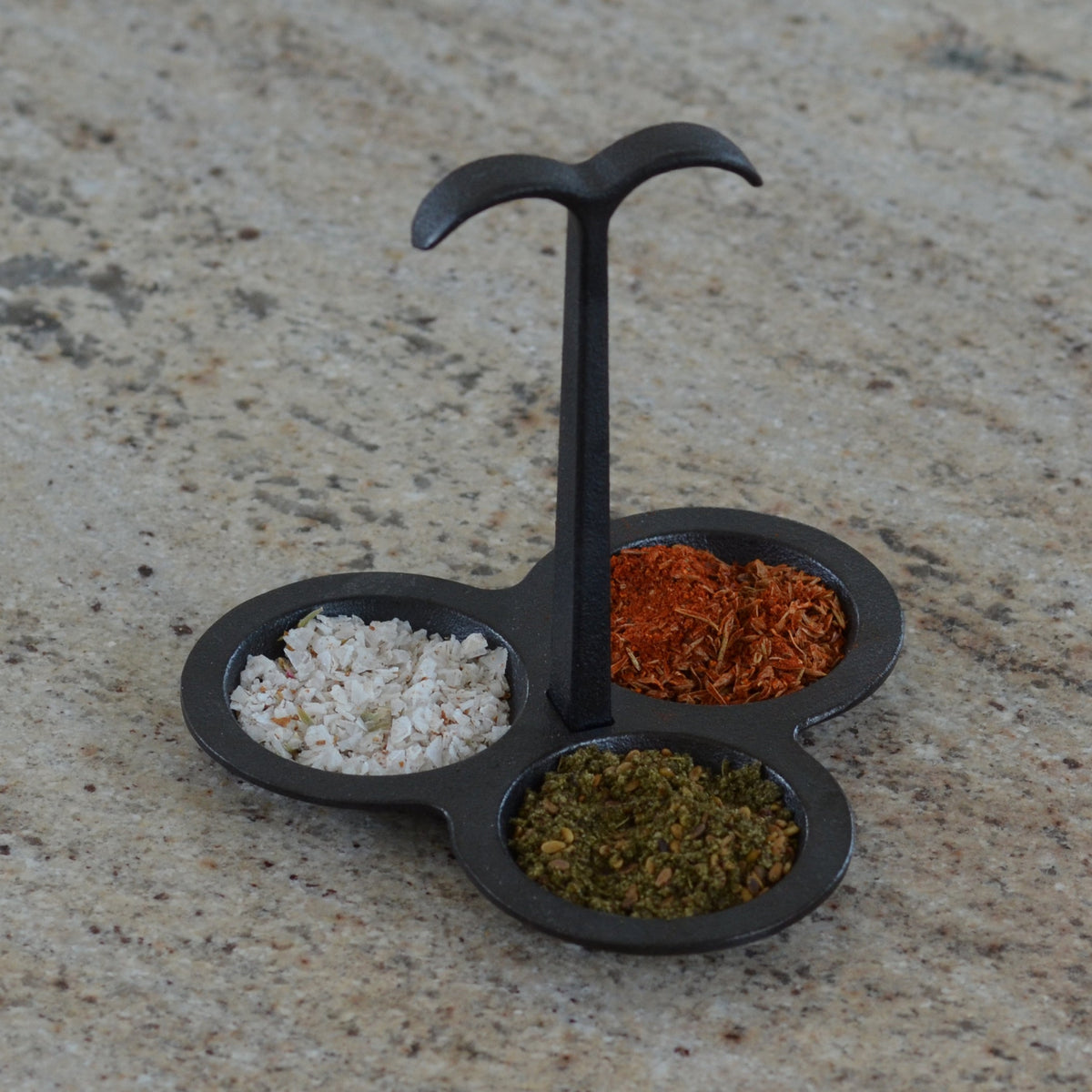 Oigen Palma Cast Iron Spice Container – holding salt, pepper and spices on stone