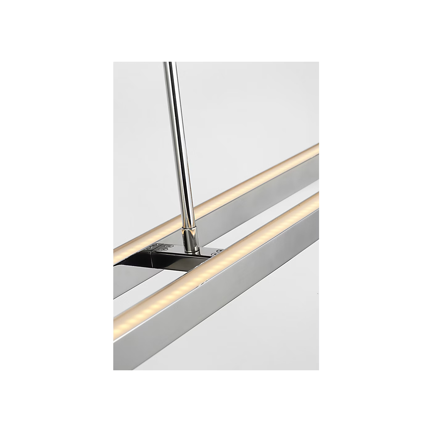 Stainless steel LED linear suspension with balanced lighting and slim design. Ideal for kitchen islands and conference tables.