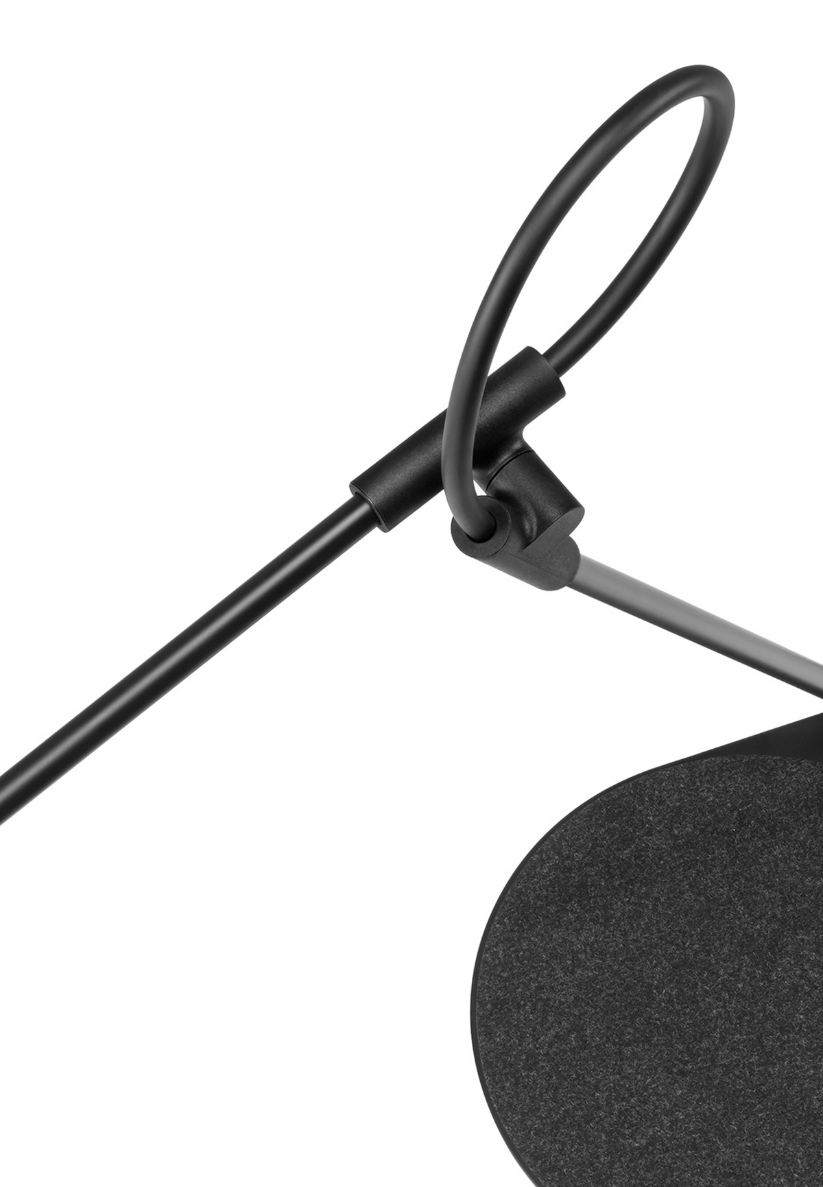 Superlight LED lamp on a desk beside a laptop