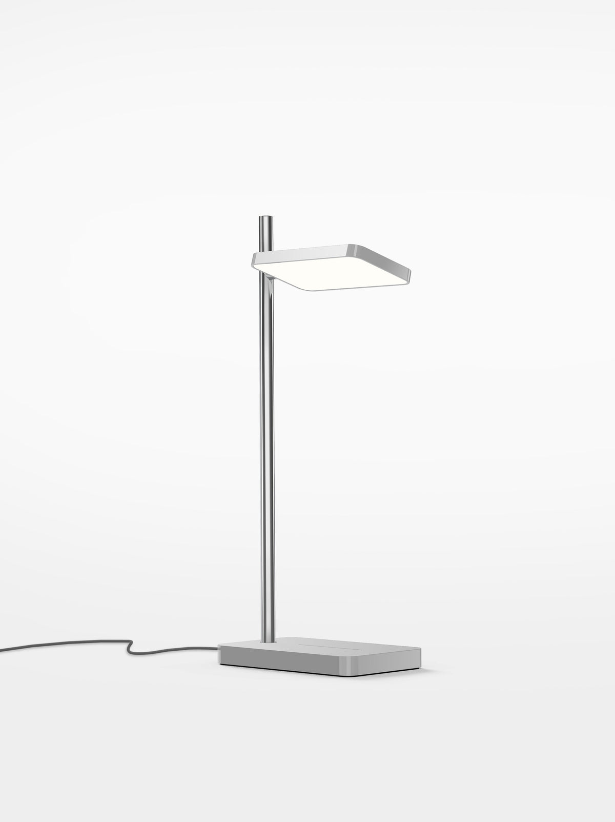 Talia desk lamp in grey with a silver metallic post, studio view