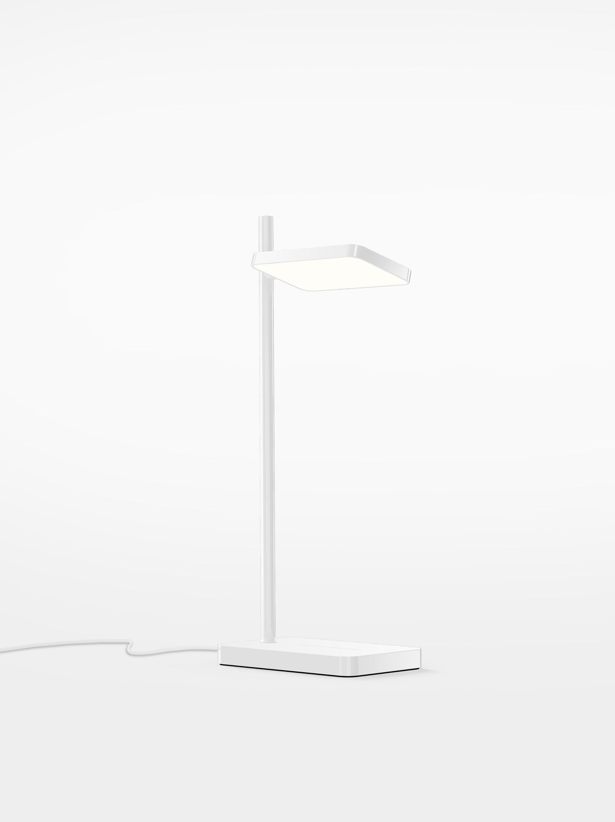 Talia desk lamp in white, studio view of the slim post and shade
