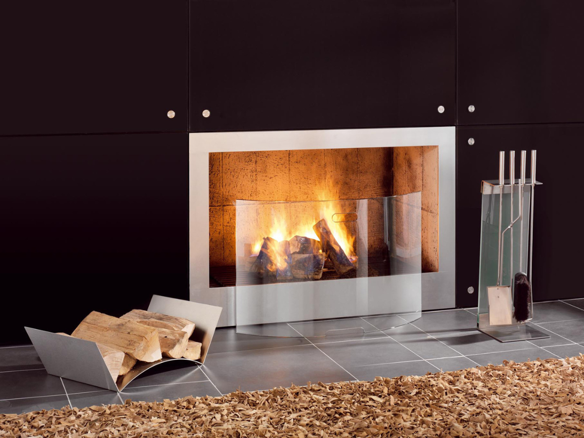 Teras Fireplace Tools with Stand by Conmoto – beside a modern fireplace with a log holder