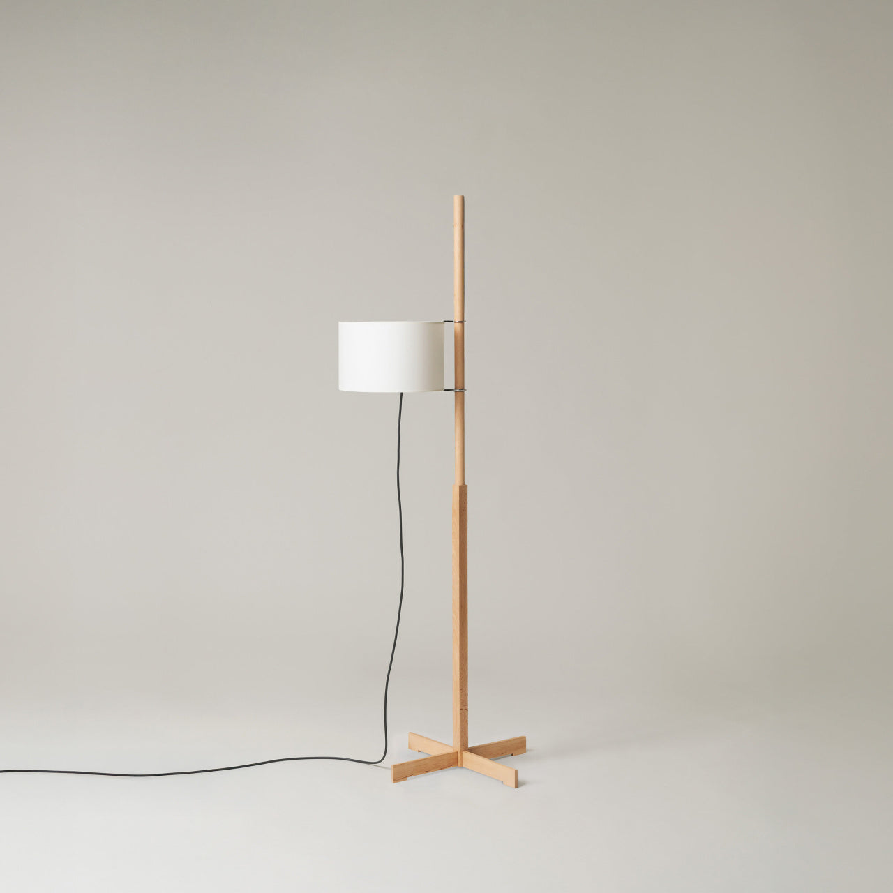 Santa & Cole beech wood floor lamp with soft ambient light and minimalist Scandinavian-inspired design