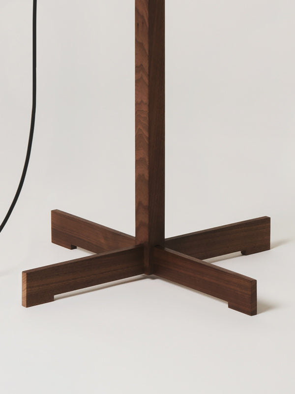 Elegant walnut finish floor lamp by Santa & Cole designed for living rooms, bedrooms, and reception areas