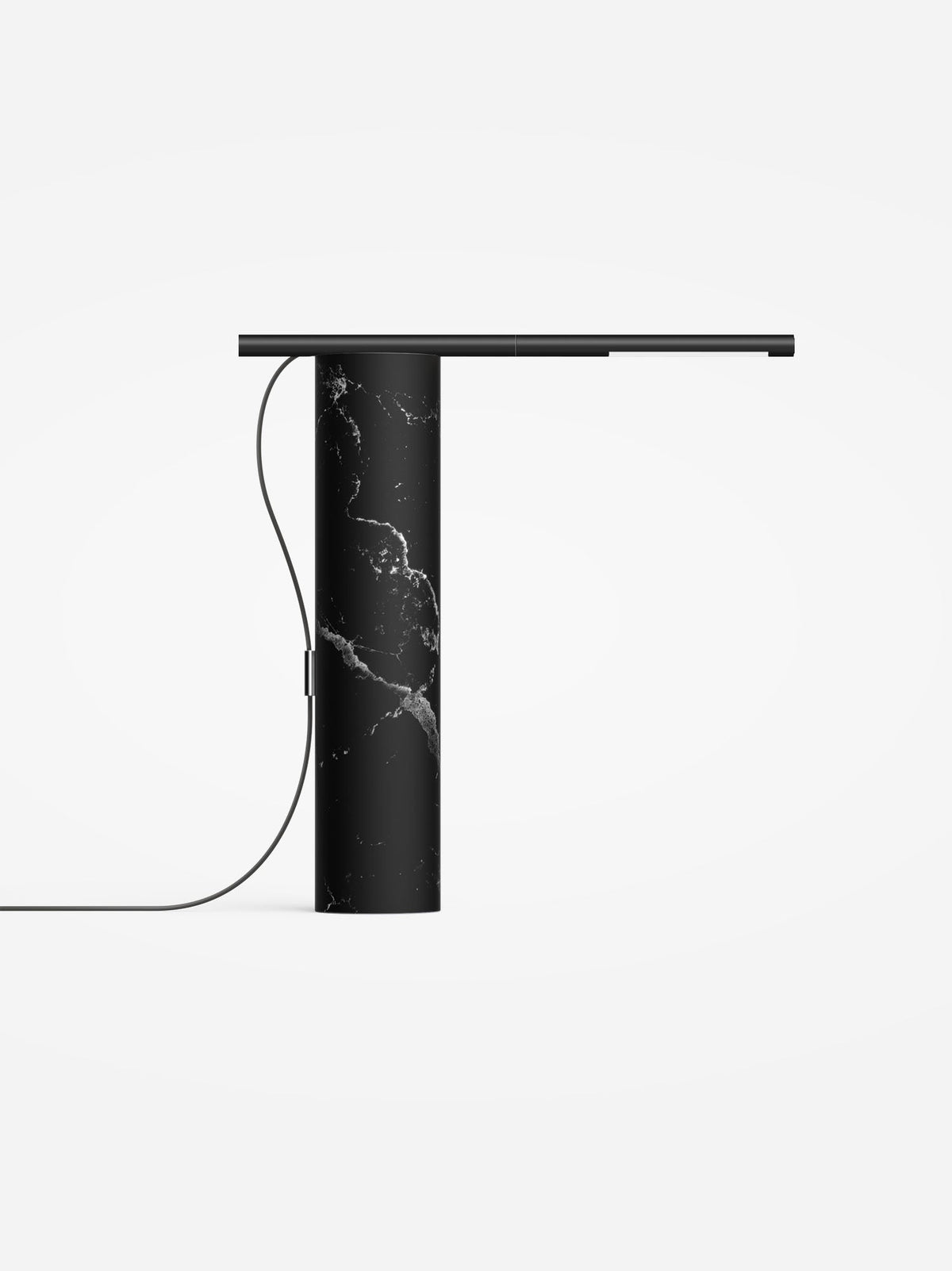 Marquina black marble base lamp with a black light arm, studio view