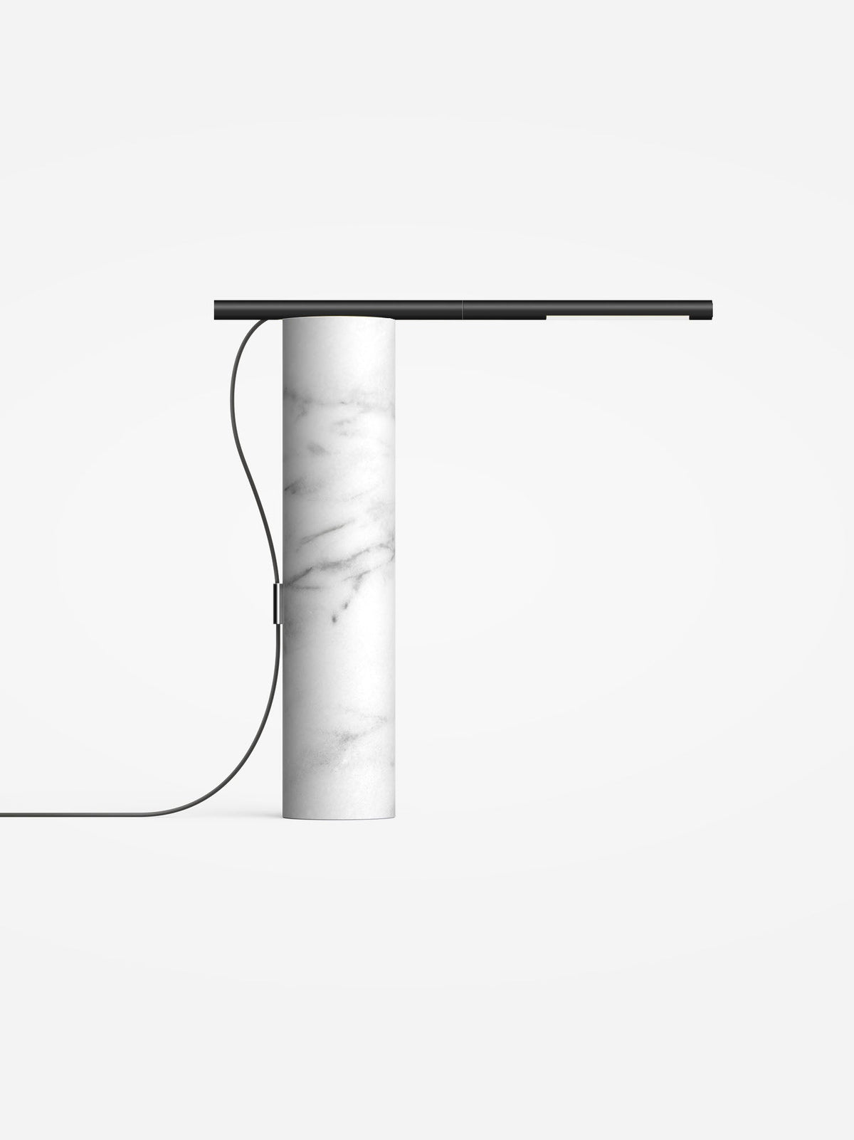 Carrara white marble base lamp with a black light arm, studio view