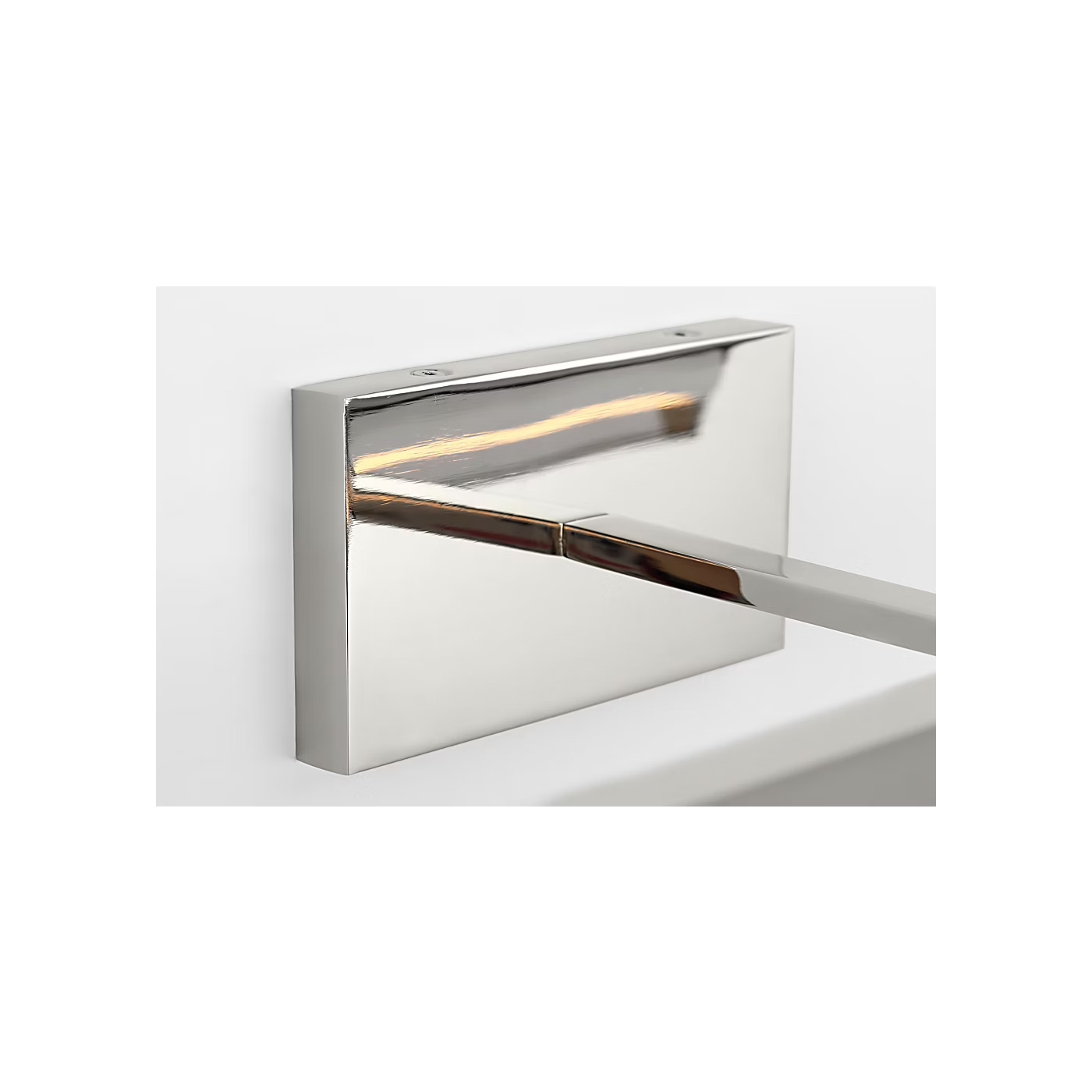 Sleek polished nickel LED picture light for bedroom and hallway artwork