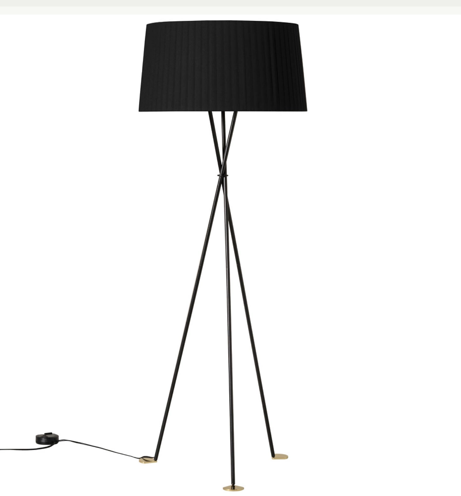 Warm ambient Tripode G5 floor lamp with black ribbon shade
