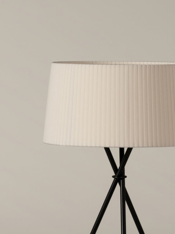 Warm ambient table lamp with natural ribbon shade