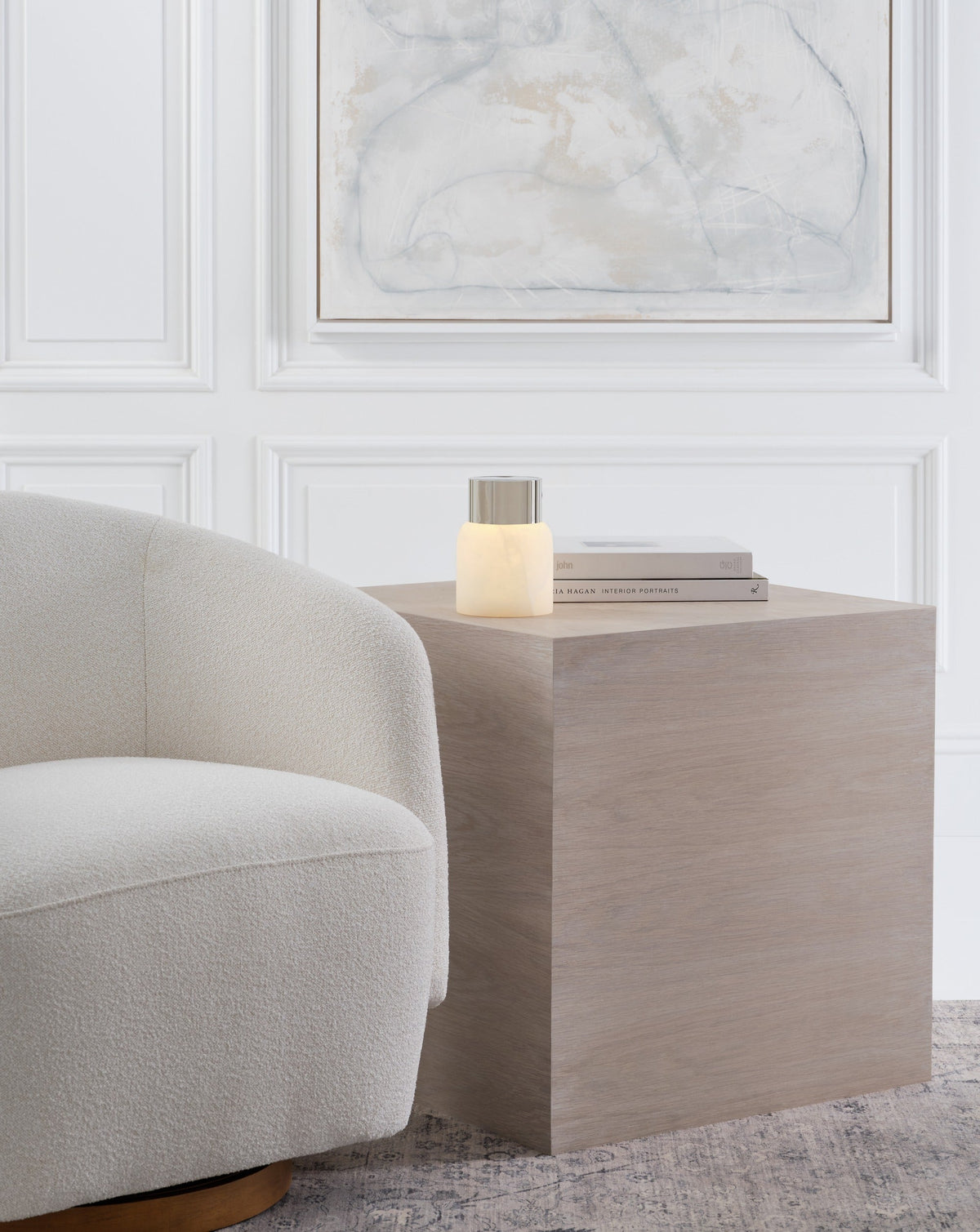 Caspe Alabaster 7 lamp lit on a table