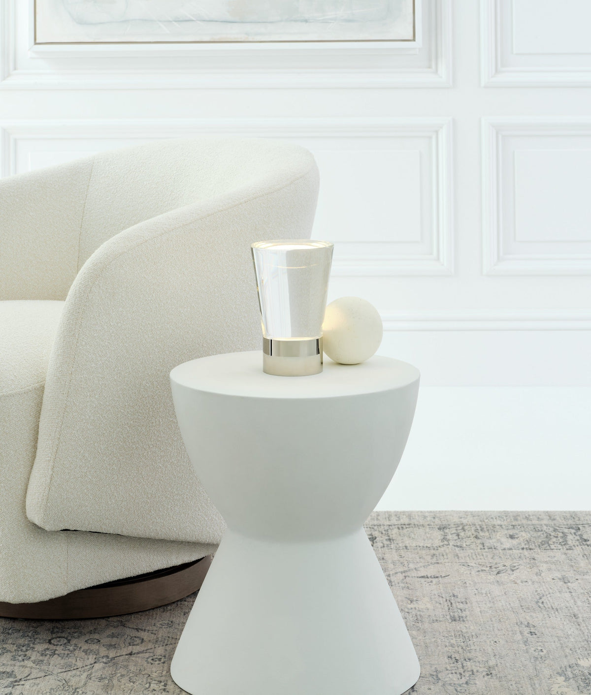 Caspe 8 lamp lit on a table