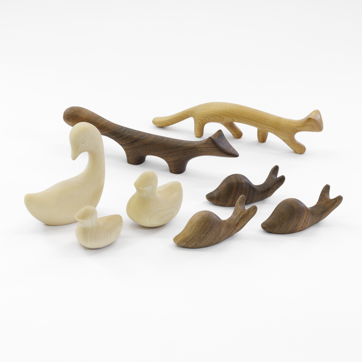 Antonio Vitali wooden animals together: goose, ducks, fox, snail and cat