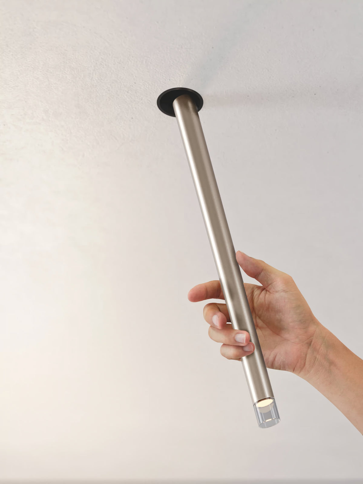 Minimalist A-Tube Nano Swing LED recessed light by Lodes for residential interiors