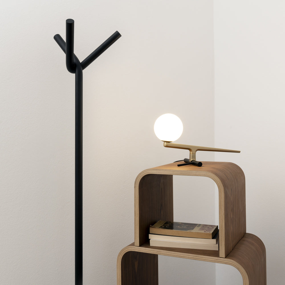 Artemide Yanzi Table Lamp on a bedroom nightstand