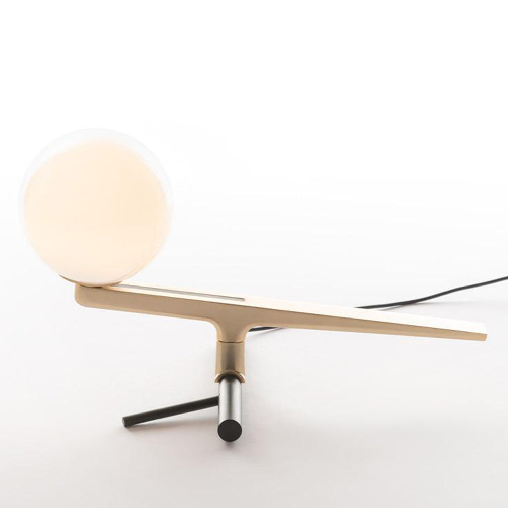 Artemide Yanzi Table Lamp on a living room side table
