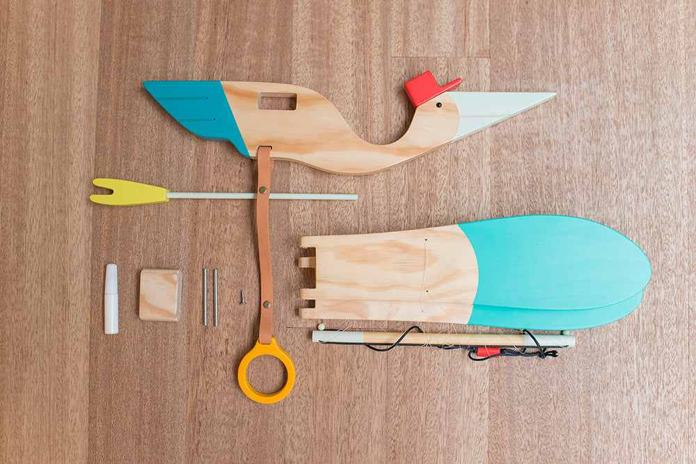 Eguchi Toys Bird Mobile Medium, Blue – parts laid out before hanging
