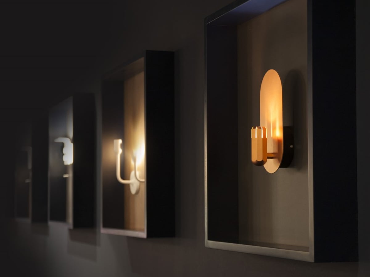 Innermost Brixton LED wall uplight by James Bartlett – in a library setting