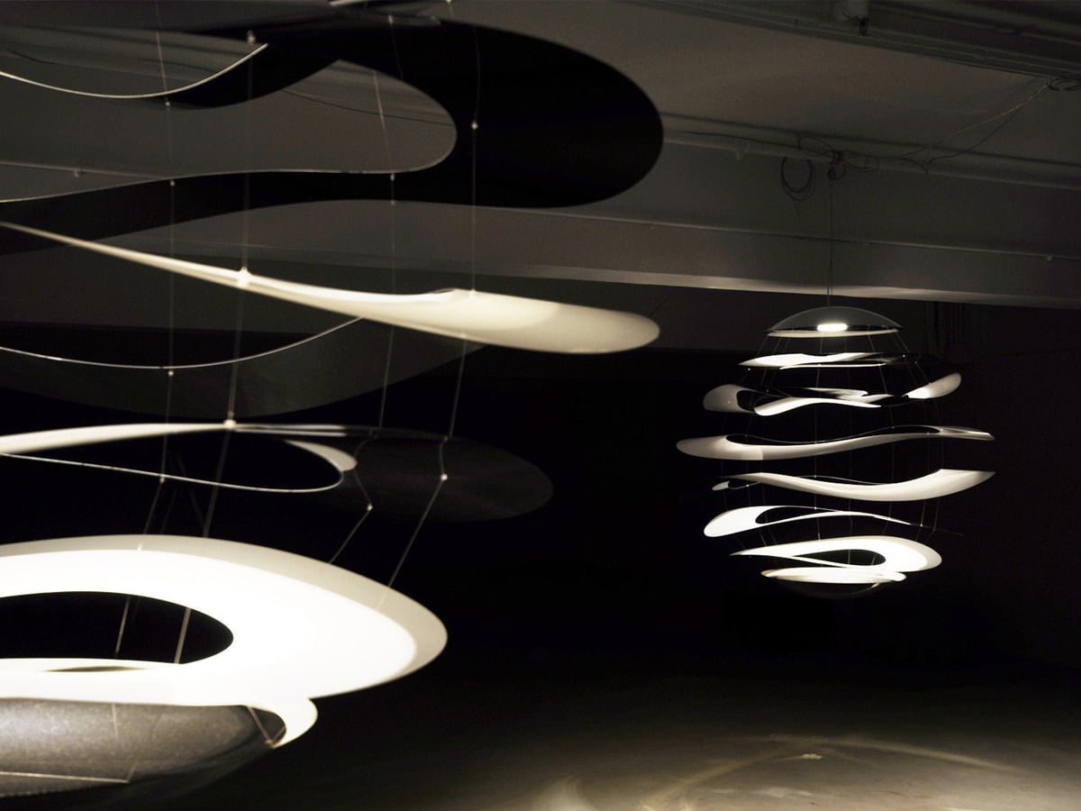 Innermost Buckle 120 LED pendant by Tina Leung – lit in a dark room