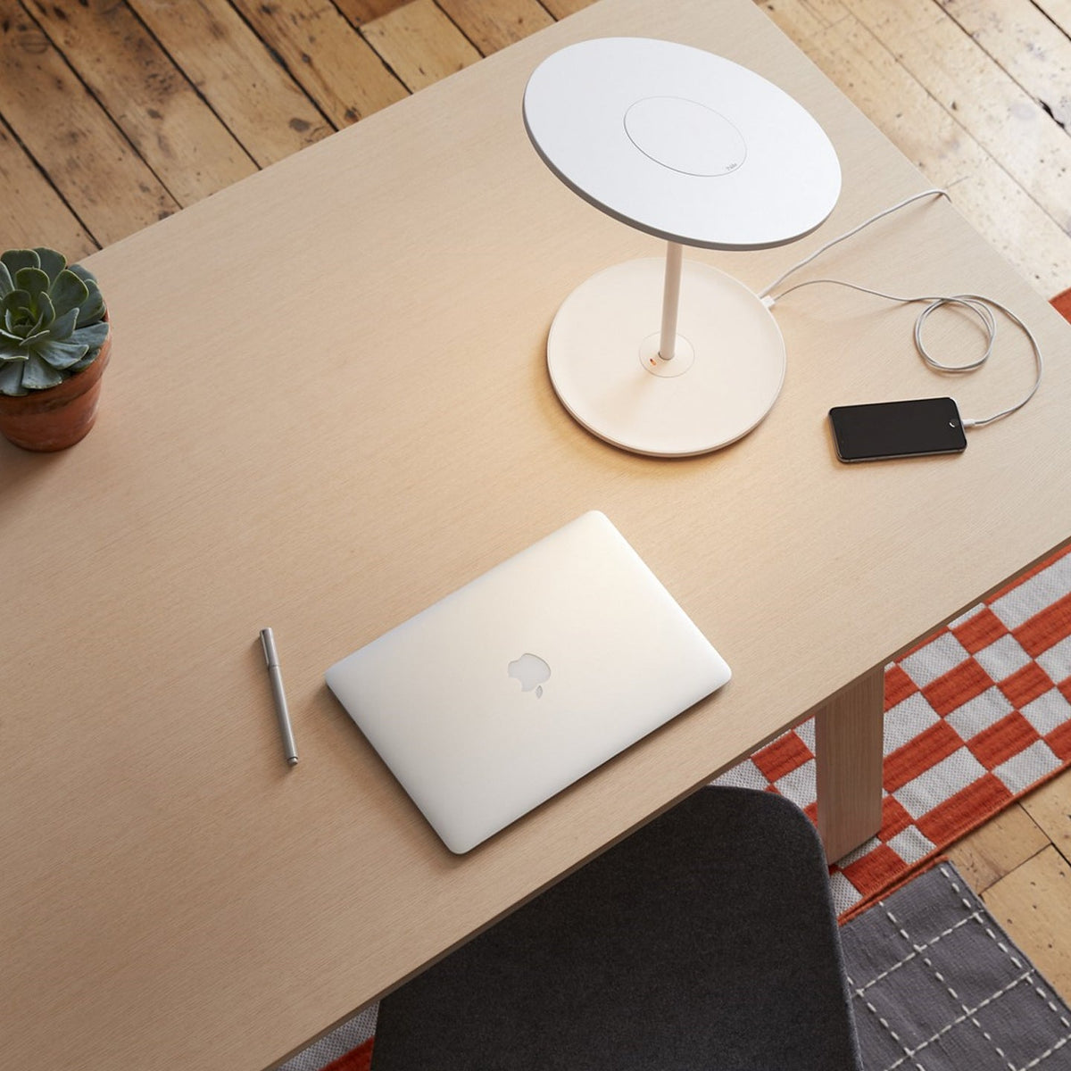 Circa lamp in an open office, environmental photo