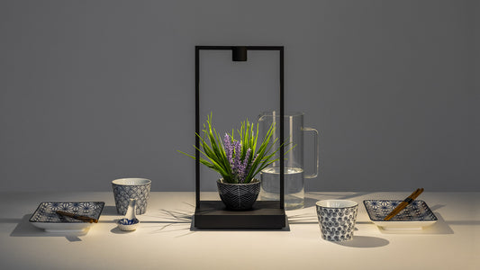 Artemide Curiosity Table Lamp in a room setting