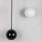 Adjustable height Innermost Boule spotlight, perfect for highlighting artwork or architectural features in galleries.
