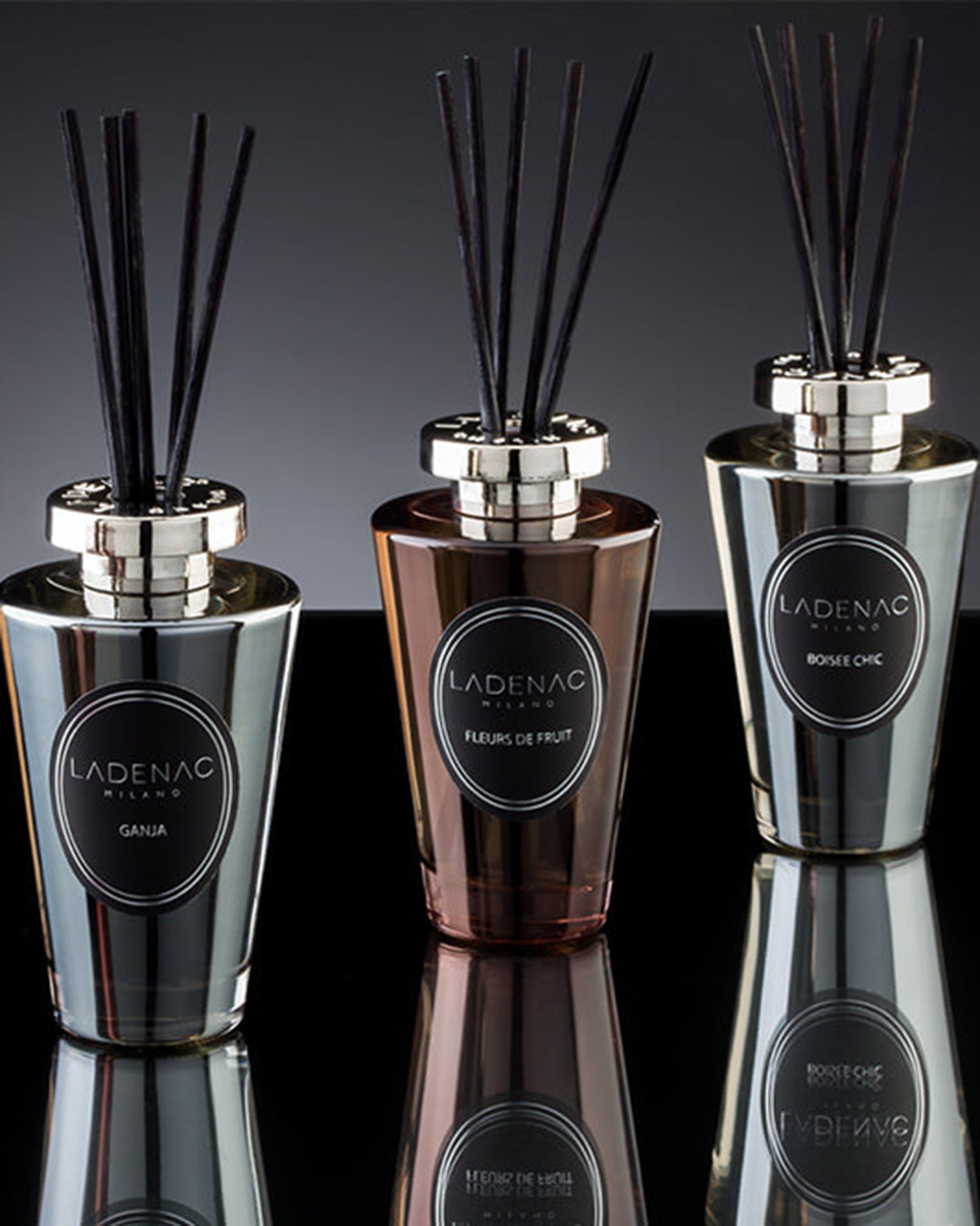 Urban Senses reed diffuser 200 ml by Ladenac Milano, silver diffusers on a dark backdrop